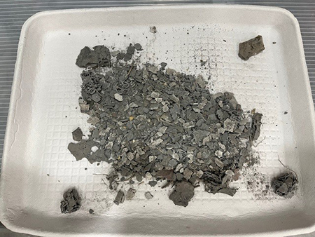 Lead battery fragments.