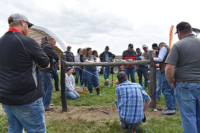 Fencing clinic participants learn about available options.